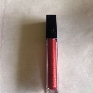 Estée Lauder Pure Color Envy #340 Flirtatious Magenta lip gloss. Full size.